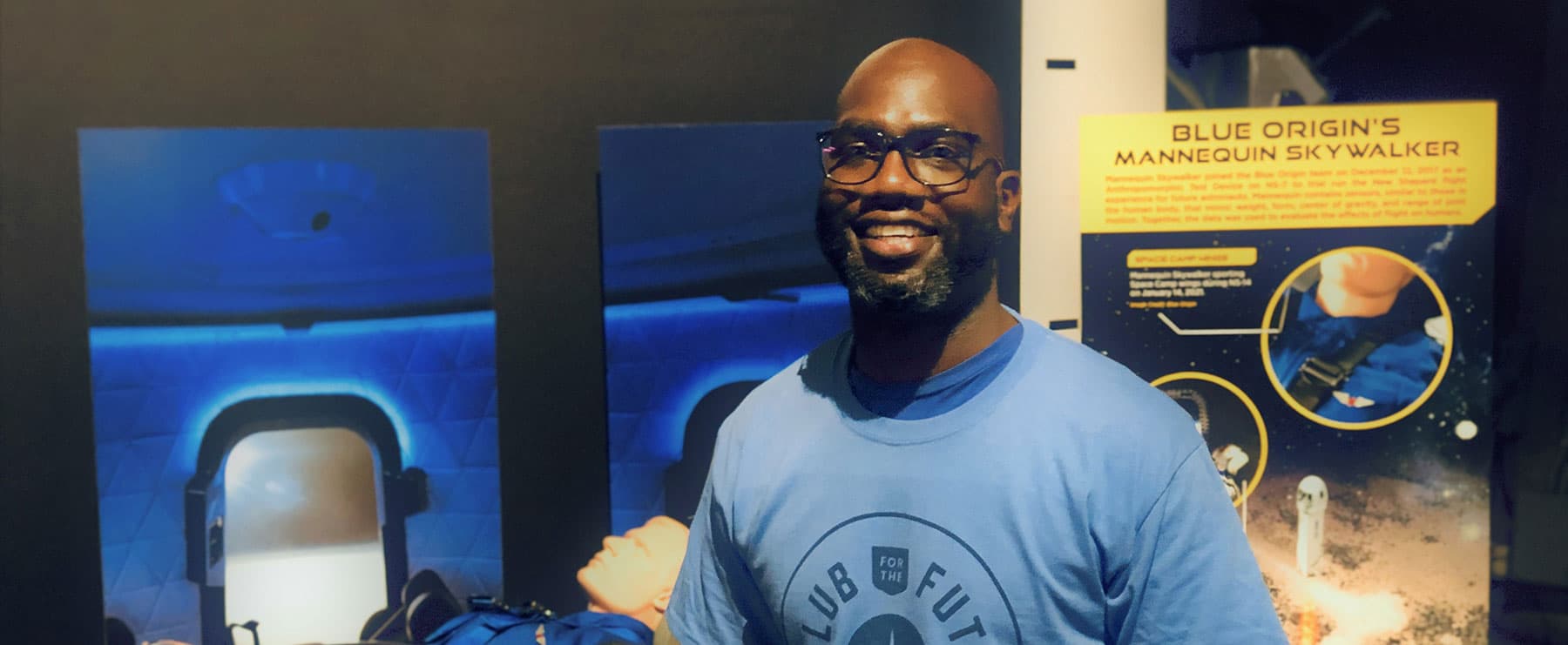 A man in a blue Club for the Future shirt